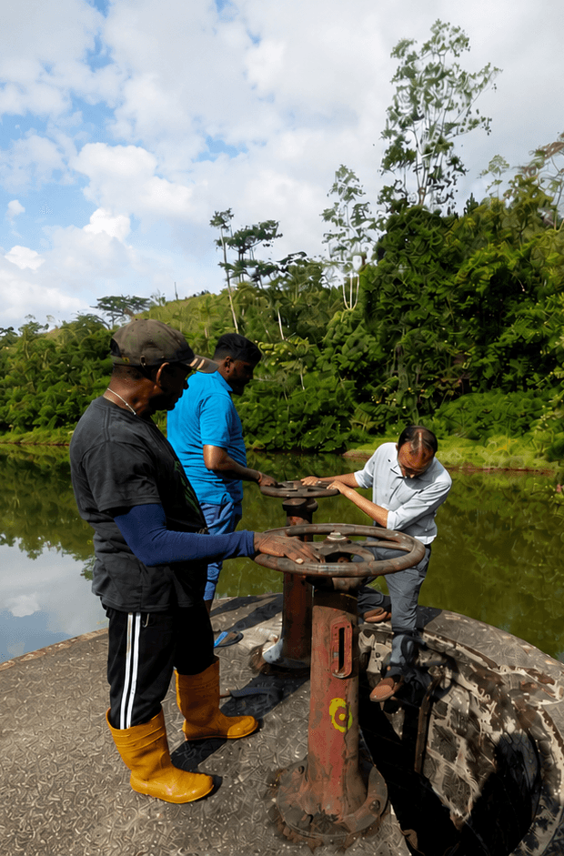 Living Heritage team working near a reservoir